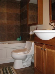 Bathroom has a jetted jacuzzi tub. Aw yeah.